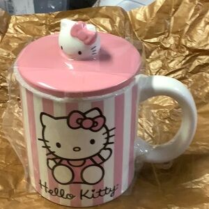 Hello Kitty mug with the top pink and white